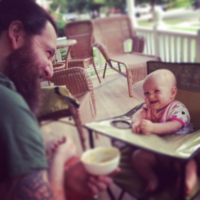 Hubs and Miss Hazel celebrating the ease of outdoor meals in the Ciao Baby portable high chair.